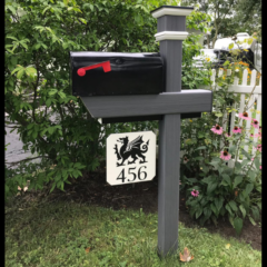 A custom version of the Essential Mailbox Post in an Arctic Blend color with one of our custom engraved signs
