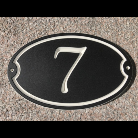 Custom house number sign on oval shaped black-white-black color core