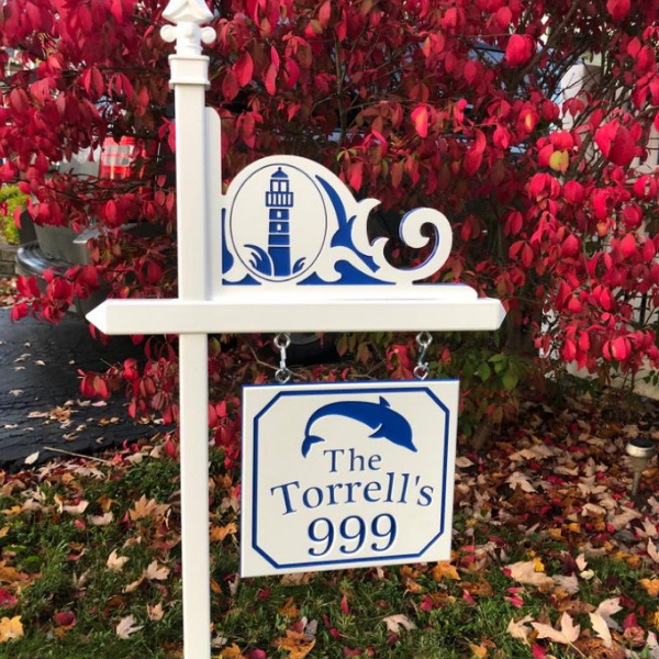 Custom house number sign with name and dolphin, plus lighthouse corner accent in white-blue-white color core