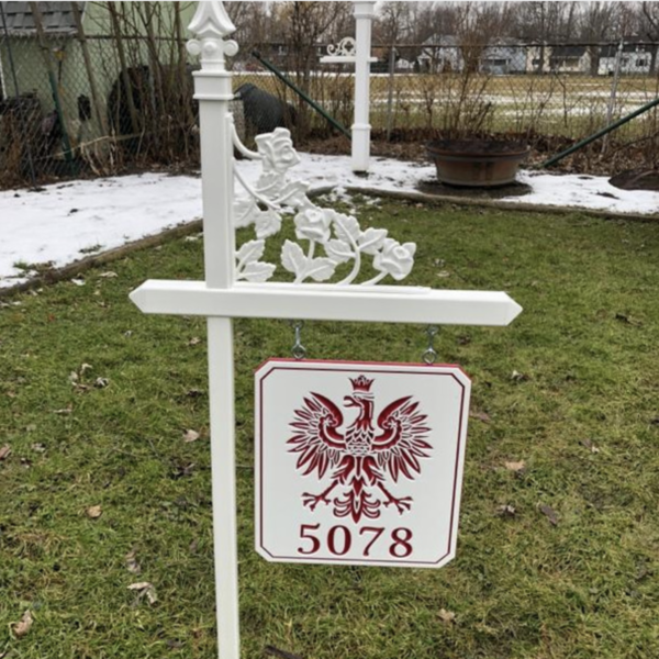 White lawn sign holder with rose scroll and white-red-white engraved sign with Polish falcon